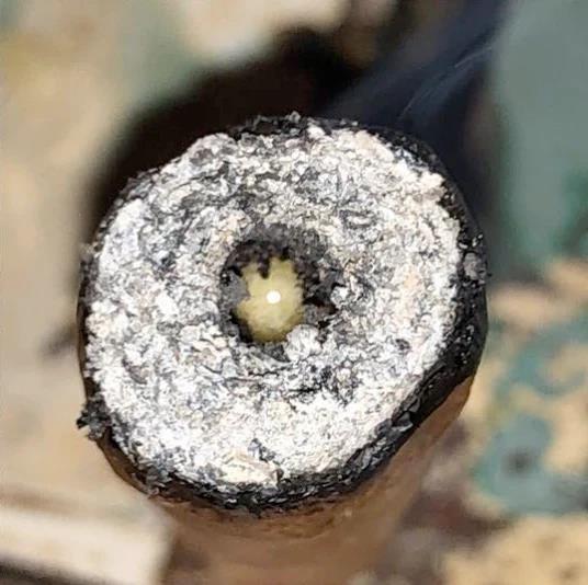 Lit end · flower wrap around a rosin core